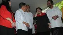 Ketua Umum Partai NasDem Surya Paloh, Ketua Umum PDIP Megawati Soekarnoputri dan Jokowi-JK tampak tertawa bahagia usai penandatanganan kesepakatan koalisi, Jakarta, Senin (19/5/14). (Liputan6.com/Herman Zakharia)