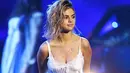 Di acara American Music Awards 2017, Selena cukup menjadi perhatian publik. Pasalnya, ada yang berbeda dari Selena saat itu. Bukan statusnya sebagai pacar Justin Bieber, namun penampilannya yang baru. (AFP/Kevin Winter)