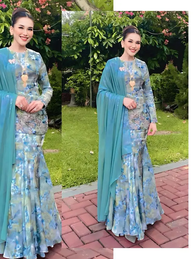 Public figure pakai baju kurung
