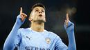Bek Manchester City, Joao Cancelo, melakukan selebrasi usai mencetak gol ke gawang Olympiakos pada laga Liga Champions di Stadion Etihad, Rabu (4/11/2020). Manchester City menang dengan skor 3-0. (AP/Dave Thompson)