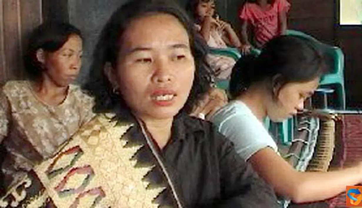 Citizen6, Lampung: seorang ibu mengenakan kain tapis, khas Lampung. (Pengirim: Lampung)