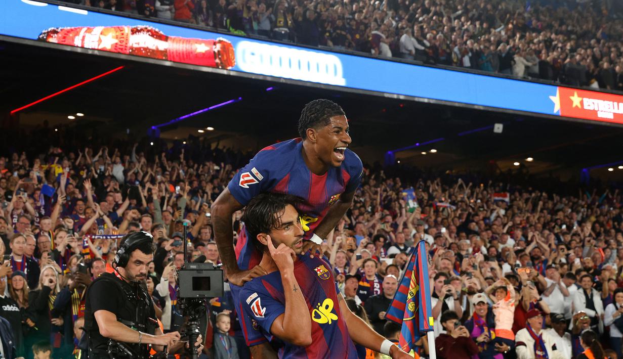 Dua gol kemenangan Blaugrana dicetak melalui Marcus Rashford (9') dan Ferran Torres (18'). (AP Photo/Joan Monfort)