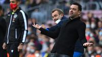Xavi Hernandez. Kembali ke Barcelona sebagai pelatih tentu menjadi tantangan tersendiri bagi gelandang yang sempat memperkuat Barcelona selama 17 musim, 1998/1999 hingga 2014/2015. Di tangannya Barcelona malah gagal lolos ke babak 16 Besar Liga Champions pertama kali dalam 21 tahun. (AFP/Lluis Gene)