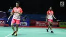 Ganda campuran Indonesia, Tontowi Ahmad/Liliyana Natsir saat melawan Yugo Kobayashi/Misaki Matsumoto (Jepang) pada 16 besar Indonesia Open 2018 di Istora GBK, Jakarta, Kamis (5/7). Tontowi/Liliyana unggul 23-21, 21-19. (Liputan6.com/Helmi Fithriansyah)