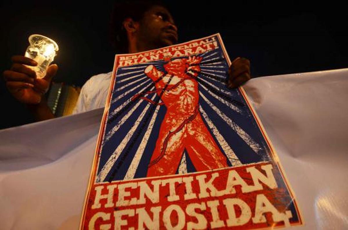Aksi lilin solidaritas untuk Papua