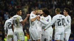 Juara grup A, Real Madrid. Klub asal Spanyol ini siap menambah gelar Liga Champions mereka yang ke-11. (AFP/Pierre-Philippe Marcou)