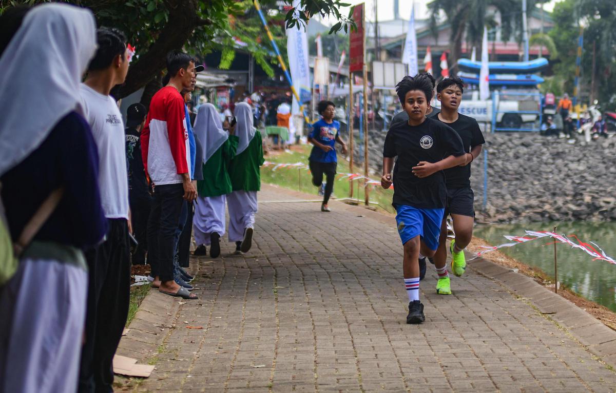 Lomba Lari Renang dan Dayung Meriahkan HUT Kemerdekaan di Situ Gintung