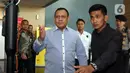 Mantan Ketua Komisi Pemberantasan Korupsi (KPK) Firli Bahuri usai menjalani pemeriksaan di Gedung ACLC KPK, Jakarta, Selasa (5/12/2023). Firli Bahuri memenuhi panggilan kedua Dewan Pengawas (Dewas) KPK untuk menjalani pemeriksaan dugaan pelanggaran etik terkait pertemuan dengan mantan Menteri Pertanian Syahrul Yasin Limpo (SYL). (Liputan6.com/Herman Zakharia)