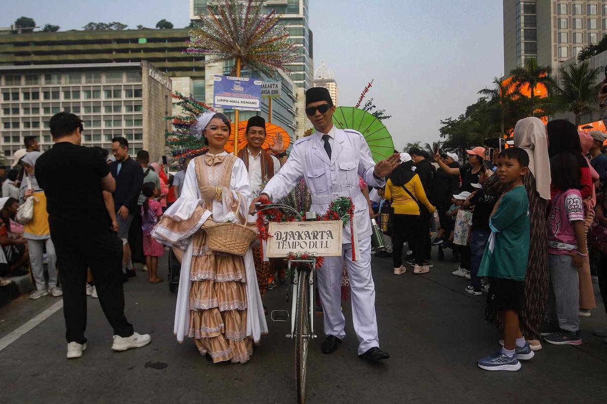 FOTO: Pawai Budaya Betawi Semarakkan HUT ke 499 Jakarta di Bundaran HI