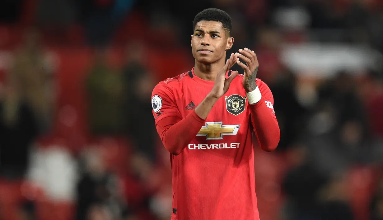 Marcus Rashford - Rashford mampu menujukan kualitasnya sebagai penyerang hasil Akademi Manchester United. Pemain berusia 22 tahun ini telah mencetak 14 gol dari 22 penampilannya bersama The Red Devils di musim ini. (AFP/Oli Scarff)