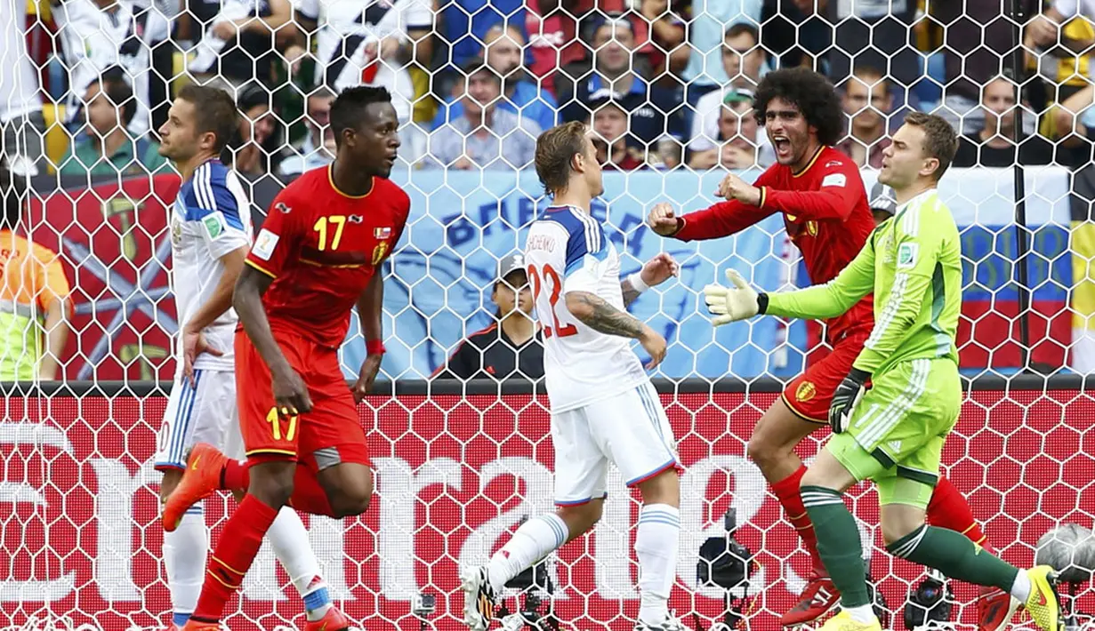 Jelang akhir laga, Divock Origi (17), sukses menjebol gawang Rusia dan membawa Belgia kokoh di puncak klasemen Grup H Piala Dunia 2014, Brasil, (22/6/2014). (REUTERS/Tony Gentile)