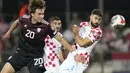 Hasil pertandingan membuat Kroasia naik ke posisi dua klasemen sementara Grup D dengan koleksi 7 poin. (AP Photo/Darko Bandic)