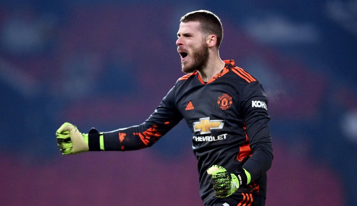 David de Gea - Kiper Setan Merah ini naik ke urutan 10 dalam tabel peraih clean sheet terbanyak di Liga Inggris setelah timnya bermain imbang tanpa gol melawan Watford. Sejauh ini kiper asal Spanyol itu telah mencatatkan 129 clean sheet. (AFP/Laurence GriffithsPool)