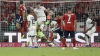 Striker Bayern Munchen, Thomas Muller, membobol gawang Hoffenheim pada laga pekan pertama Bundesliga 2018-2019, di Allianz Arena, Sabtu (25/8/2018). (AP Photo/Matthias Schrader)
