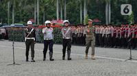 Pasukan gabungan saat mengikuti apel Operasi Lilin 2022 di Monas, Jakarta, Kamis (22/12/2022). Ratusan ribu personel gabungan dilibatkan dalam Operasi Lilin 2022. (Liputan6.com/Angga Yuniar)