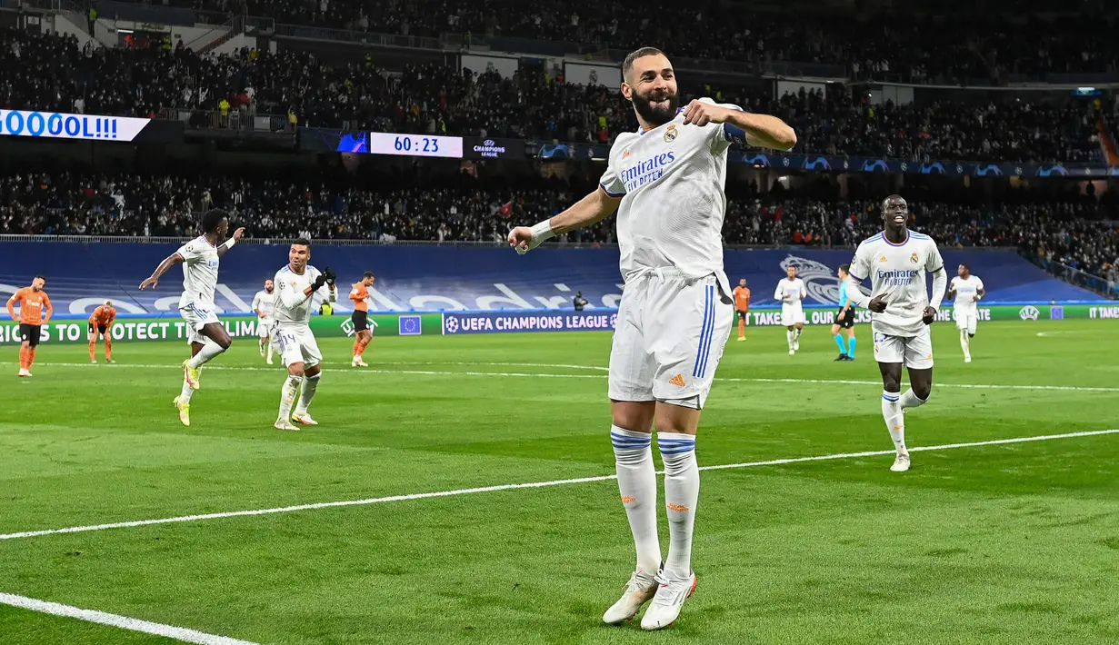 Real Madrid akan melakoni penampilan di perempatfinal Liga Champions yang ke-19 kali pada musim ini usai mengalahkan PSG dengan agregat 3-2. Meniliki lebih jauh, Los Blancos merupakan klub tersukses Liga Champions dengan raihan 13 kali gelar juara. (AFP/Pierre-Philippe Marcou)
