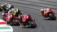 Danilo Petrucci (9) memenangkan balapan MotoGP Italia. (AP Photo/Antonio Calanni)