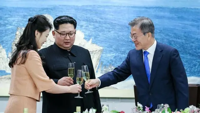 Kim Jong-un dan Ri Sol-ju (Foto: AFP)