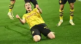 Gelandang Borussia Dortmund #20 Marcel Sabitzer merayakan gol keempat timnya yang dicetak ke gawang Atletico Madrid pada leg kedua perempat final Liga Champions 2023/2024 di Signal Iduna Park, Rabu (17/4/2024) dini hari WIB. (INA FASSBENDER / AFP)