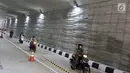 Sejumlah pengendara motor melintasi underpass Kartini di kawasan Lebak Bulus, Jakarta Selatan, Jumat (23/2). (Liputan6.com/Immanuel Antonius)