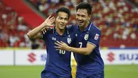 Sebagai salah satu raksasa Asia Tenggara, Thailand memiliki komposisi pemain yang merata di tiap lini, tak terkecuali dalam ajang Piala AFF 2020. Sebagai ujian terakhir untuk melepas dahaga gelar, Timnas patut mewaspadai 5 pemain Thailand berikut di partai final. (AP/Suhaimi Abdullah)