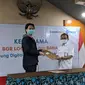 Vincent Iswara, CEO dan Co-Founder DANA dan M. Kuncoro Wibowo, Direktur Utama PT Bhanda Ghara Reksa (Persero) atau BGR Logistics.