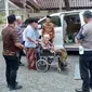 Kiai Haji Maimoen Zubair atau Mbah Maimoen mendadak enggan naik mobil pribadi dan memilih naik mobil Patroli dan Pengawalan (Patwal) Polisi. (Liputan6.com/Ahmad Adirin)