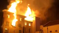 Bangunan ini juga dikenal sebagai Menara Gading, kobaran api dalam semalam telah membuat bangunan terkenal di Uganda itu rusak parah (Makarere Univeristy)