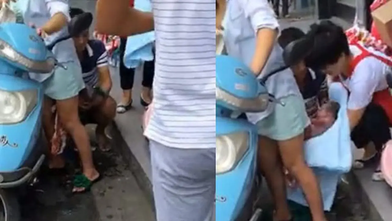 Emak-emak melahirkan bayi di skuter listrik.