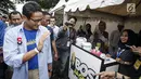 Calon Wakil Presiden Nomor urut 02 sekaligus tokoh entrepreneur Sandiaga Uno menyapa wirausaha milenial saat menghadiri Sragen Young Entrepreneur Summit (YES) 2019 di Sragen, Jawa Tengah, Minggu (24/2). Kegiatan yang digelar KAHMIPreneur dihadiri 7.000 kaum milenial. (Liputan6.com/HO/Nando)