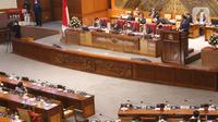 Suasana Rapat Paripurna ke-13 DPR RI beragendakan Pembicaraan Tingkat II/Pengambilan Keputusan atas RUU tentang Ibu Kota Negara di Kompleks Parlemen, Jakarta, Selasa (18/1/2022). DPR mengesahkan RUU Ibu Kota Negara (IKN) menjadi Undang-Undang. (Liputan6.com/Angga Yuniar)