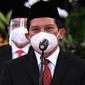 Ali Ghufron Mukti resmi dilantik jadi Direktur Utama BPJS Kesehatan saat pelantikan Dewan Pengawas dan Direksi BPJS Kesehatan 2021-2026 oleh Presiden Joko Widodo (Jokowi) di Istana Kepresidenan Jakarta pada Senin, 22 Februari 2021. (Humas BPJS Kesehatan)