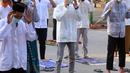 Umat muslim melaksanakan salat Idul Adha 1442 H di Masjid Masjid Jami Al-Mubarok, Tangerang, Banten, Selasa (20/7/2021). Sebagian masjid melakukan pelaksanaan salat Idul Adha 1442 H, namun dengan protokol kesehatan yang ketat. (Liputan6.com/Angga Yuniar)