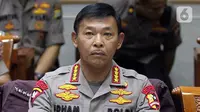 Kapolri Jenderal Polisi Idham Azis saat rapat kerja perdana dengan Komisi III DPR di Kompleks Parlemen, Jakarta, Rabu (20/11/2019). Rapat membahas anggaran, pengawasan, dan isu-isu terkini di Indonesia termasuk bom bunuh diri di Polrestabes Medan. (Liputan6.com/JohanTallo)