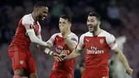 Striker Arsenal, Alexandre Lacazette, melakukan selebrasi usai membobol gawang Napoli pada laga leg kedua perempat final Liga Europa di Stadio San Paolo, Kamis (18/4/2019). Napoli takluk 0-1 dari Arsenal. (AP/Luca Bruno)