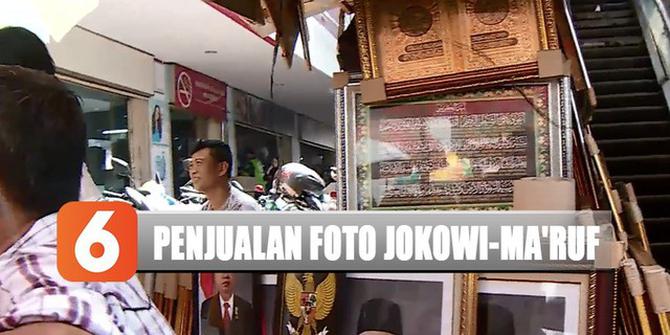 Jelang Pelantikan, Foto Jokowi-Ma'ruf Diserbu di Pasar Baru