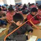 Cara unik yang dilakukan salah satu sekolah Tiongkok untuk mencegah anak muridnya terkena myopia atau rabun jauh (Foto: http://www.chinasmack.com/)