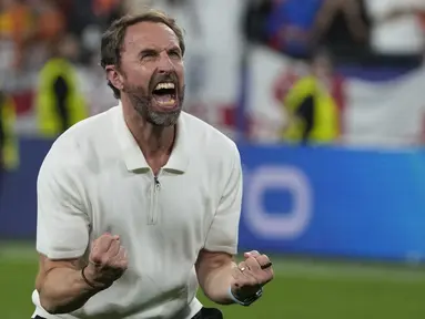 Gareth Southgate menjadi sosok yang paling bahagia setelah berhasil membawa timnya ke Final Euro 2024. (AP Photo/Thanassis Stavrakis)