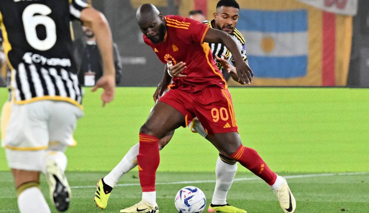 Tuan rumah memimpin duluan lewat Romelu Lukaku. (Andreas SOLARO / AFP)