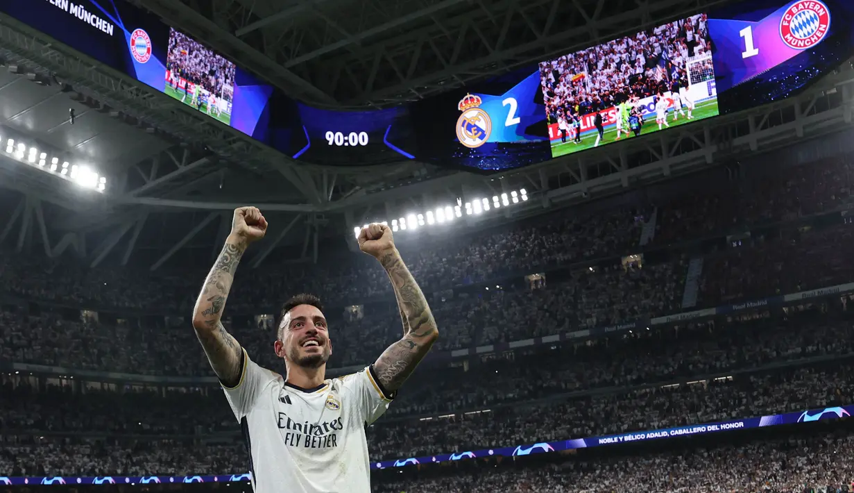 Di penghujung laga, Real Madrid berhasil bangkit dan berbalik unggul lewat aksi Joselu yang melesakkan dua gol di menit-menit akhir pertandingan. (Thomas COEX/AFP)