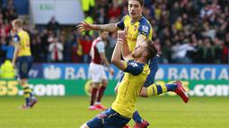 Aaron Ramsey menjadi pahlawan kemenangan Arsenal setelah mencetak gol di menit 12