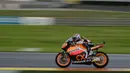 Marc Marquez mengendarai motor Honda saat membela tim Catalunya Caixa Repsol dan meraih gelar juara dunia Moto2 musim 2012. (AFP/Javier Soriano)