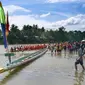 Festival Pacu Jalur yang diadakan secara tahunan oleh warga Kabupaten Kuansing. (dok. warisanbudaya.kemdikbud.go.id)