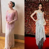 Tampil anggun seperti Ayu Dewi dengan kebaya dress full payet yang hadir dalam palet warna ombre pink-putih. [@askyfebrianti]