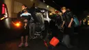 Sekelompok orang Venezuela, Haiti dan Kolombia telah menghabiskan lebih dari dua minggu terjebak di daerah perbatasan setelah meninggalkan Arica di Chili utara karena Peru menolak untuk mengizinkan mereka melanjutkan perjalanan ke kota Tacna, dengan alasan mereka tidak memiliki dokumentasi yang diperlukan. (Photo by AGUSTIN MERCADO / AFP)