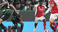 Winger Arsenal, Bukayo Saka, berhasil mencetak satu gol saat timnya menang 5-1 atas Sporting CP pada laga kelima league phase Liga Champions musim ini di&nbsp;Estadio Jose Alvalade, Lisbon, Rabu (27/11/2024) dini hari WIB.&nbsp;(AP Photo/Armando Franca)