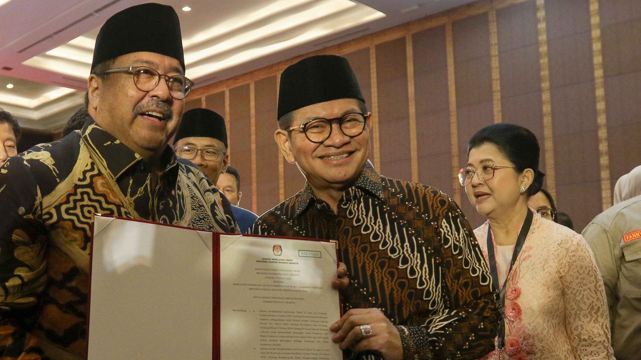 FOTO: Senyum Pramono-Rano Resmi Ditetapkan Jadi Gubernur dan Wakil Gubernur Jakarta Terpilih