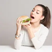 Kiat Tetap Langsing untuk si Doyan Makan (Lithian/Shutterstock)