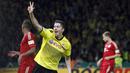 Nama Robert Lewandowski (tengah) sangat akrab di telinga fans Dortmund. Selama empat tahun membela Dortmund, ia jadi sosok yang sangat diandalkan di lini serang Die Borussen. (Foto: AP/Michael Sohn)