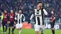 Penyerang Juventus Paulo Dybala merayakan gol ke gawang AC Milan pada perempat final Coppa Italia, Kamis (26/1/2017) dinihari WIB. Juventus berjaya 2-1. (AP Photo/Alessandro Di Marco)